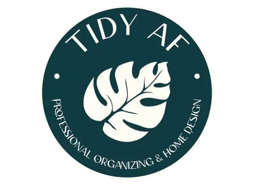 Dark green circle logo with a white leaf and text: “TIDY AF Professional Organizing & Home Design.”.